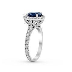Halo Blue Sapphire Oval Cut Diamond Engagement Ring In 18 Karat White Gold