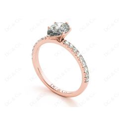 Marquise Cut Claw Set Diamond ring with pave set side stone in 18K Rose