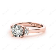 Radiant square cut three stone diamond ring claw set centre stone in 18K Rose