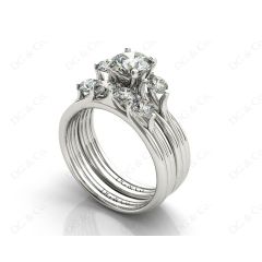 Round Cut Diamond three stones wedding set rings with claw set side stone in Platinum
