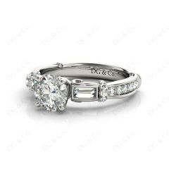 Round Cut Vintage Style Three Stone Engagement Ring with Tapered Baguette Bezel Set and Pavé Set Side Stones in Platinum