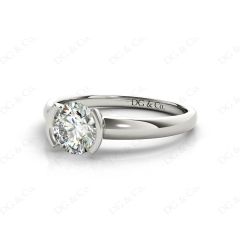Round Cut Bezel Set Diamond Ring on a Plain Band in Platinum