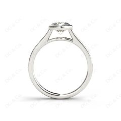 Round Cut Bezel Diamond Ring with Channel Set Side Stones in Platinum