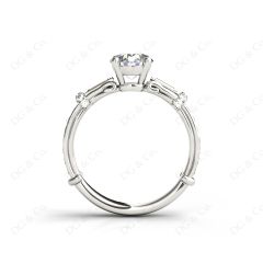 Round Cut Vintage Style Three Stone Engagement Ring with Tapered Baguette Bezel Set and Pavé Set Side Stones in Platinum