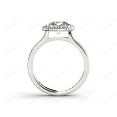 Vintage Style Round Cut Halo Diamond Ring with Bezel Set Centre Stone in Platinum