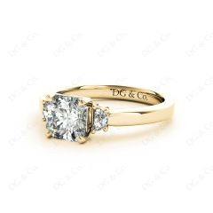 Radiant square cut three stone diamond ring claw set centre stone in 18K Yellow