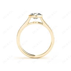 Round Cut Bezel Diamond Ring with Channel Set Side Stones in 18K Yellow