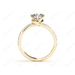 Round Cut Split Shank Diamond Engagement Ring with a Twist Band and Pave Set Side Stones in 18K Yellow